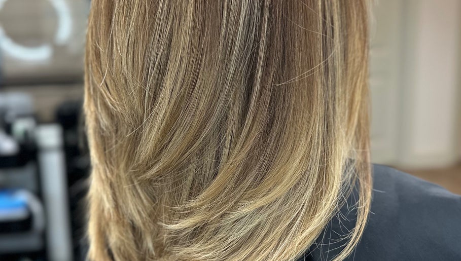 Close-up of sleek layered haircut at Celebrity Hairstylist, Toronto, Ontario, CA.