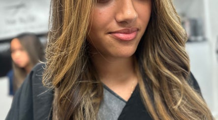 Customer with styled hair at Celebrity Hairstylist, Toronto, Ontario, CA.