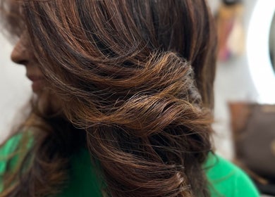 Close-up of styled brown hair at Celebrity Hairstylist, Toronto, Ontario, CA.