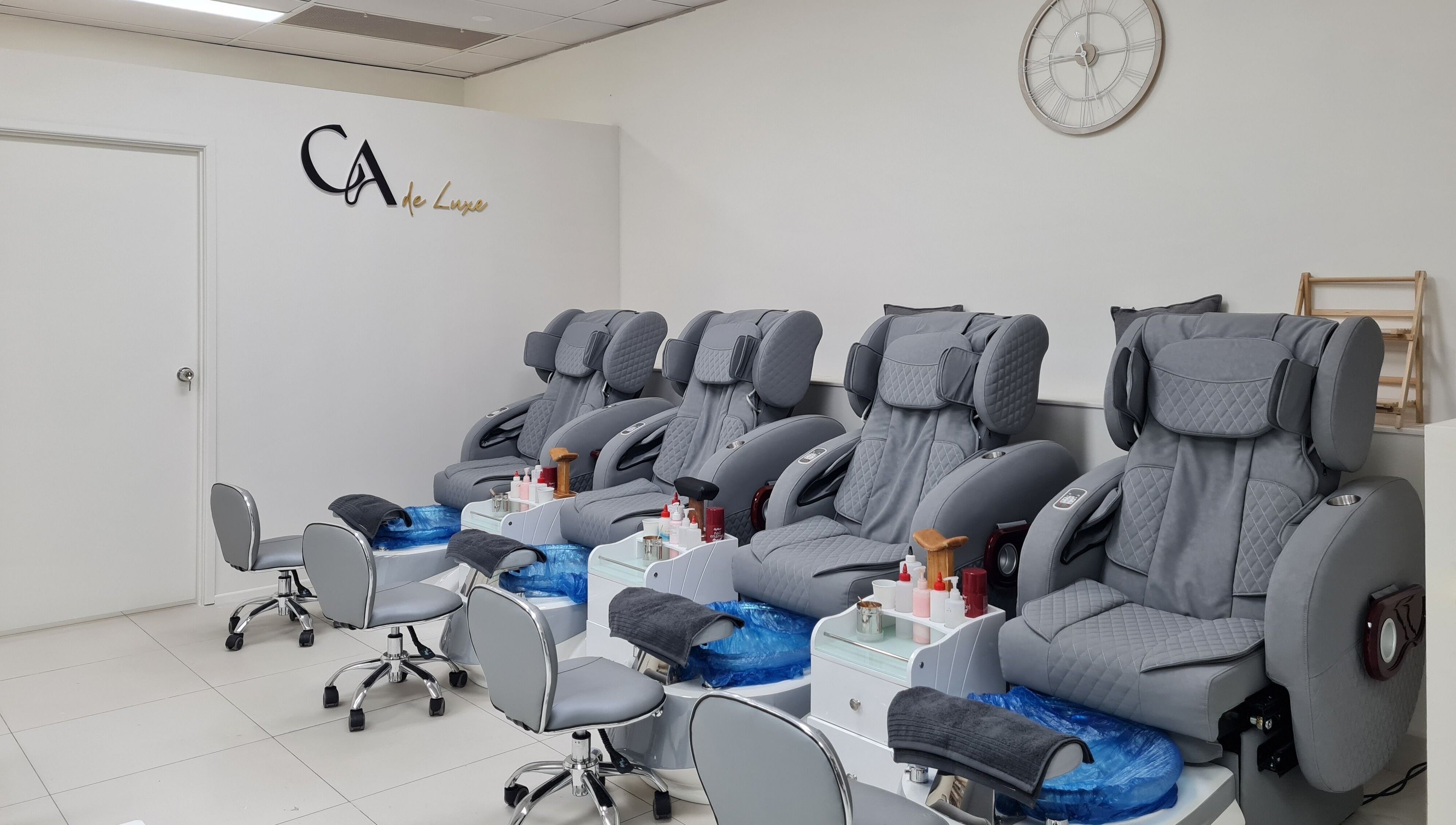 Comfortable pedicure chairs at CA de Luxe Nails in Oxenford, Queensland, AU, ready for a relaxing experience.