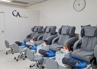 Comfortable pedicure chairs at CA de Luxe Nails in Oxenford, Queensland, AU, ready for a relaxing experience.