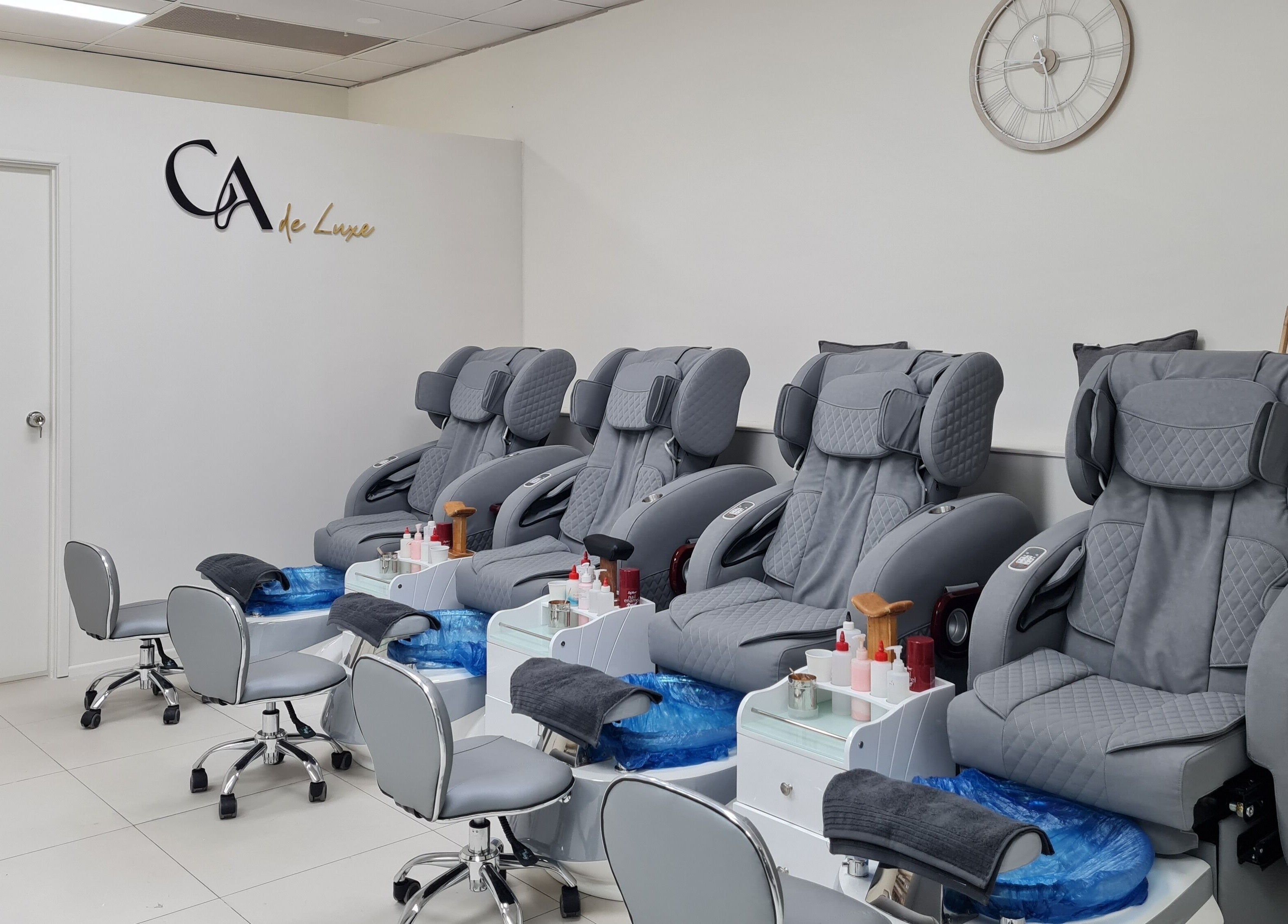 Comfortable pedicure chairs at CA de Luxe Nails in Oxenford, Queensland, AU, ready for a relaxing experience.