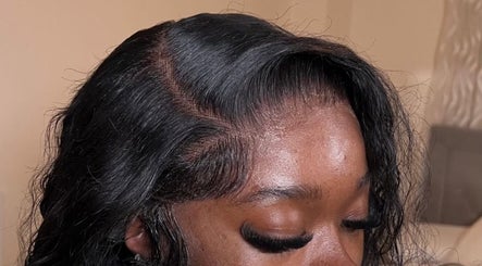 Close-up of sleek hairstyle created at Theseamlesslook, Buckingham, England, GB.