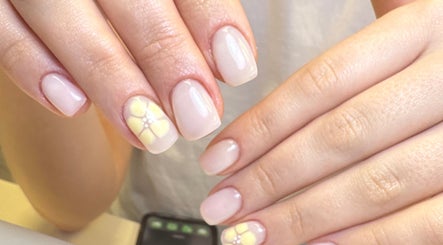 Close-up of elegant floral nail art at Molly’s Nail Club, Birmingham, England, GB.