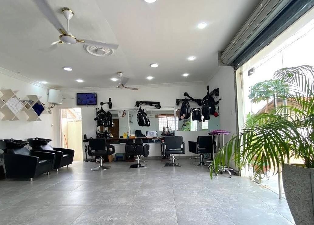 Modern interior of Charisma Salon and Spa, Adenta Municipality, Greater Accra Region, GH, with stylish decor.