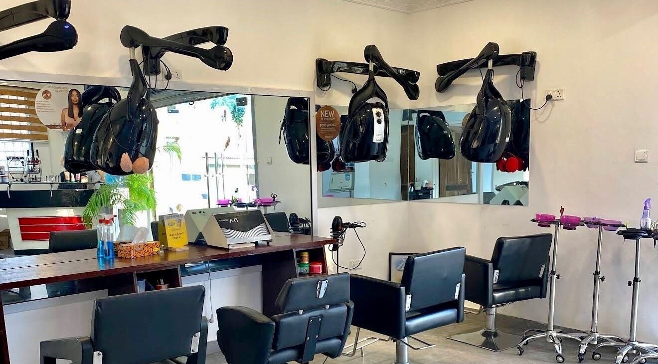 Stylish hairdressing chairs at Charisma Salon and Spa, Adenta Municipality, Greater Accra Region, GH.