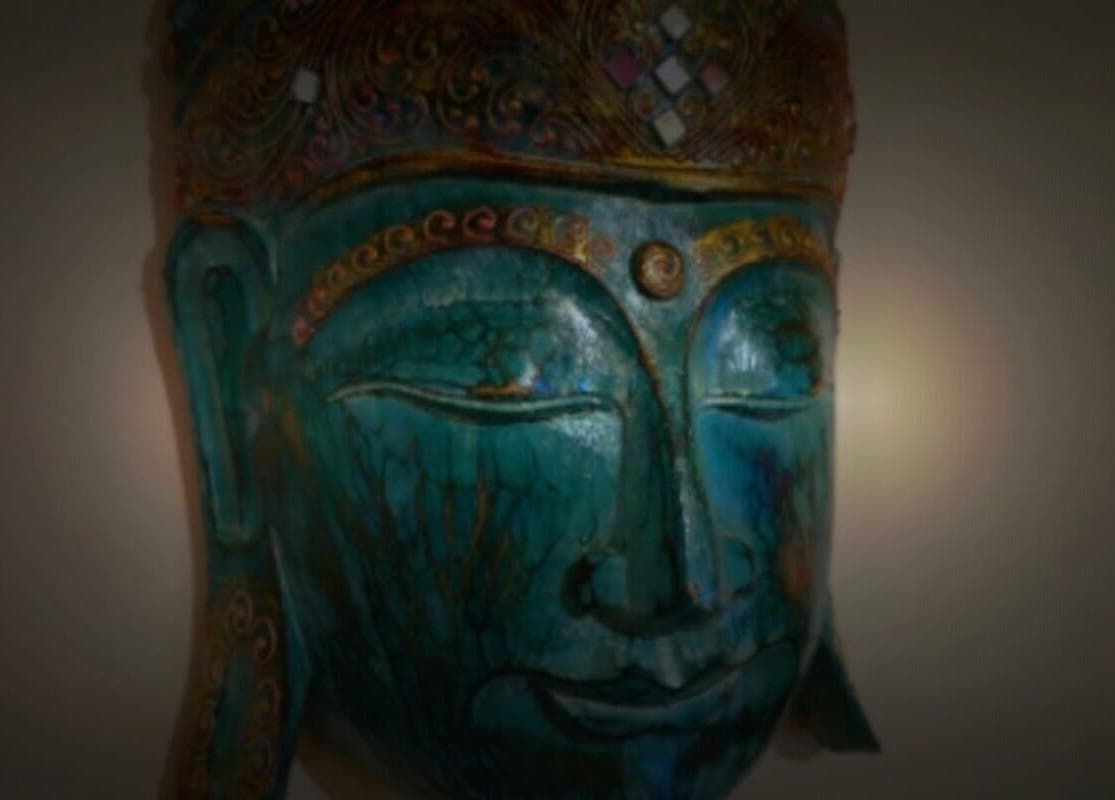 A serene Buddha sculpture at Emma Meredith International Reiki Practitioner, Chertsey, England, GB.