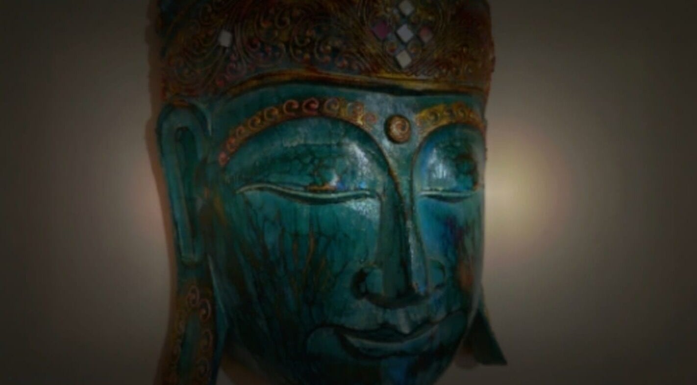 A serene Buddha sculpture at Emma Meredith International Reiki Practitioner, Chertsey, England, GB.