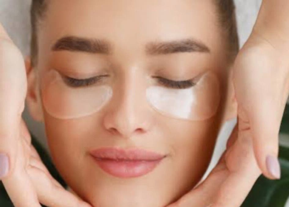 Woman enjoying a relaxing facial massage at TheClarkeComplextion, Plymouth, England, GB.