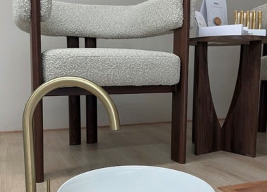 Elegant pedicure area at Vida Brows & Lashes, Hamilton, Scotland, GB with plush seating and gold faucet.