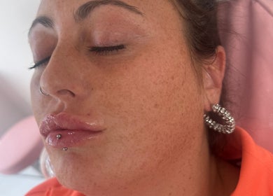 Close-up of a woman enjoying a skincare treatment at L&L Signature Skin, Glasgow, Scotland, GB.