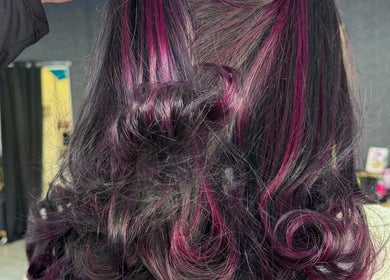 Elegant pink and black curls at Beautyby_evie_x, Wisbech, England, GB showcasing hair artistry.