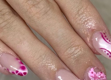 Beautiful pink nail art by Beautyby_evie_x in Wisbech, England, GB, showcasing floral designs.