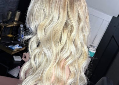 Blonde wavy hair styled at Beautyby_evie_x salon in Wisbech, England, GB.