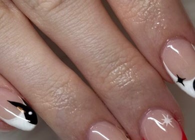 Stylish nail art at Beautyby_evie_x in Wisbech, England, GB showcasing creative design.