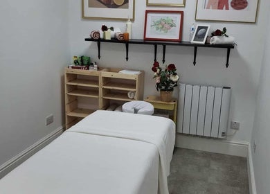 Tranquil massage room at Ottoman Novus Spa in Dublin, County Dublin, IE, featuring soothing decor and relaxing ambiance.