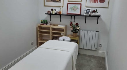 Tranquil massage room at Ottoman Novus Spa in Dublin, County Dublin, IE, featuring soothing decor and relaxing ambiance.