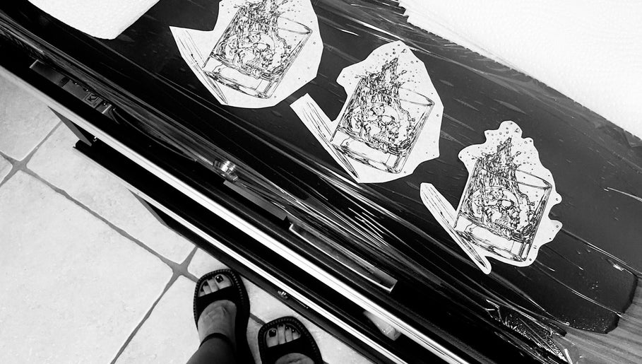 Tattoo sketches displayed at Demuz tattoos, Mykonos, Cyclades, GR, showcasing art and creativity.