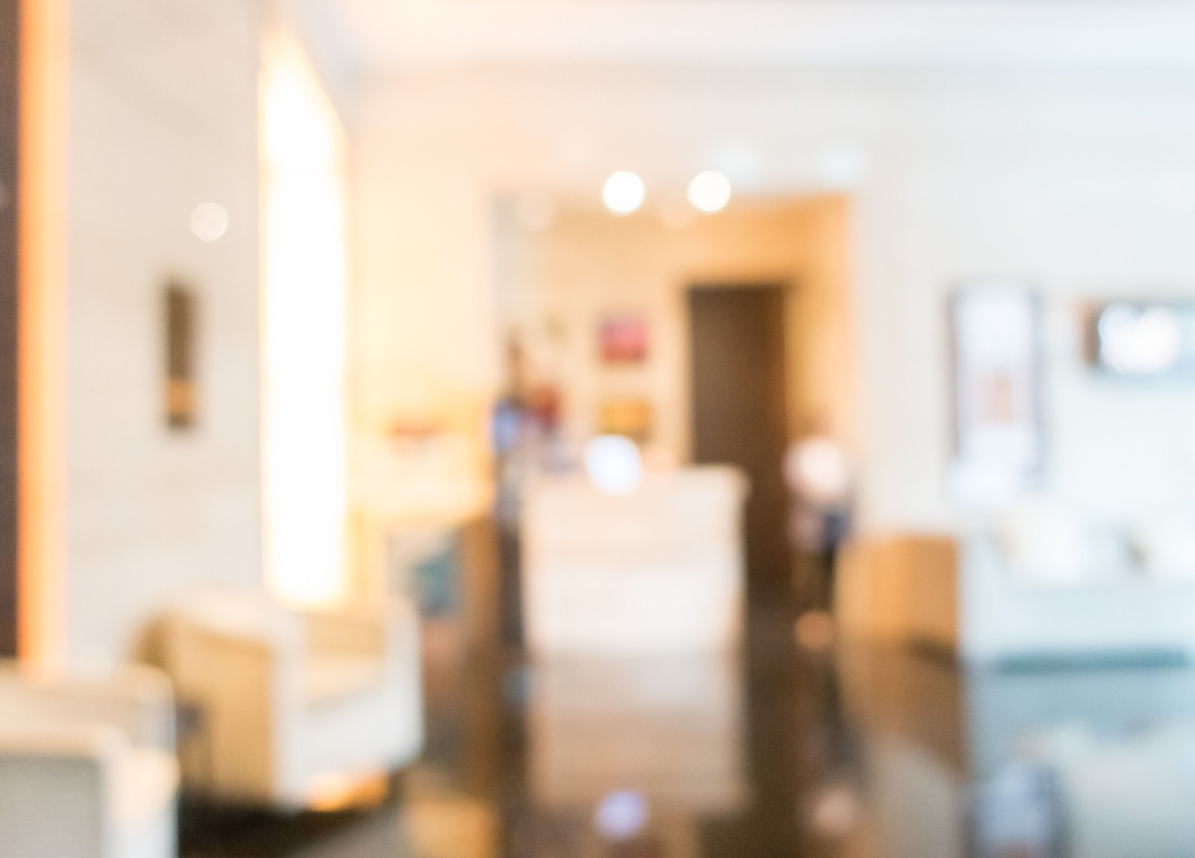 Chic interior of Confidence By Angela Randeniya, Melbourne, Victoria, AU with modern seating and soft lighting.