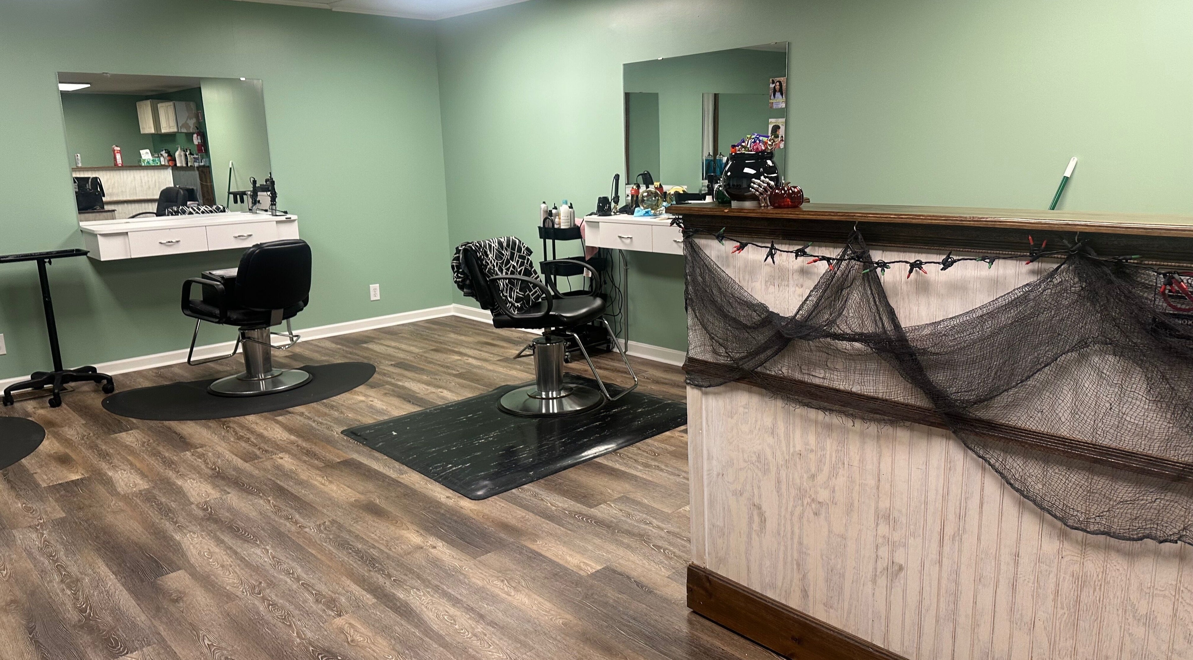 Modern interior of The Style Lab Beauty Salon in Bentleyville, Pennsylvania, US with sleek styling chairs and decor.