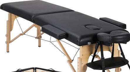 Luxurious massage table at Mobile - Velvet Touch Maalish, Hounslow, England, GB offering ultimate relaxation.