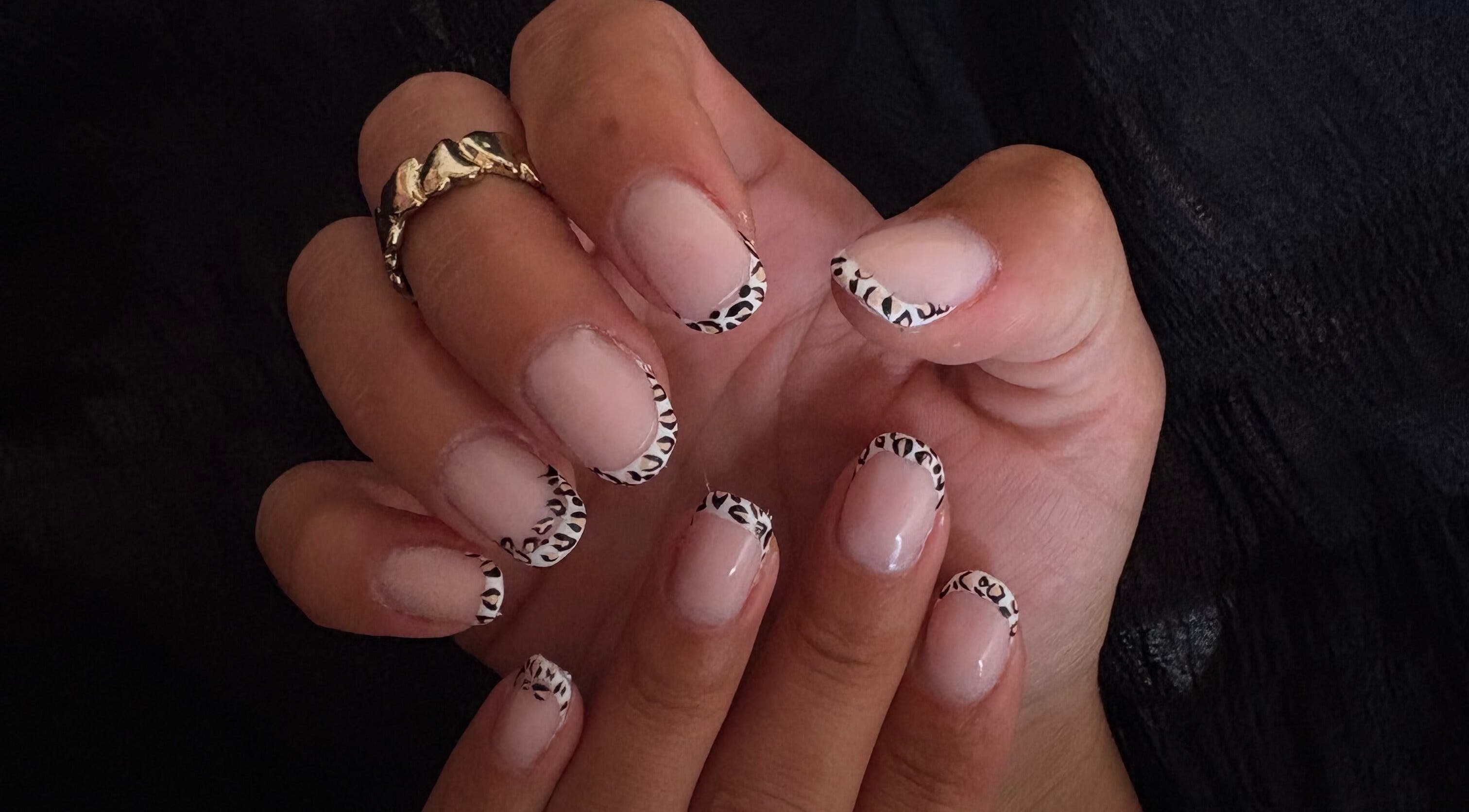 Design d'ongles léopard chez Paradis Nails, Aÿ-champagne, Grand Est, FR, manucure élégante.