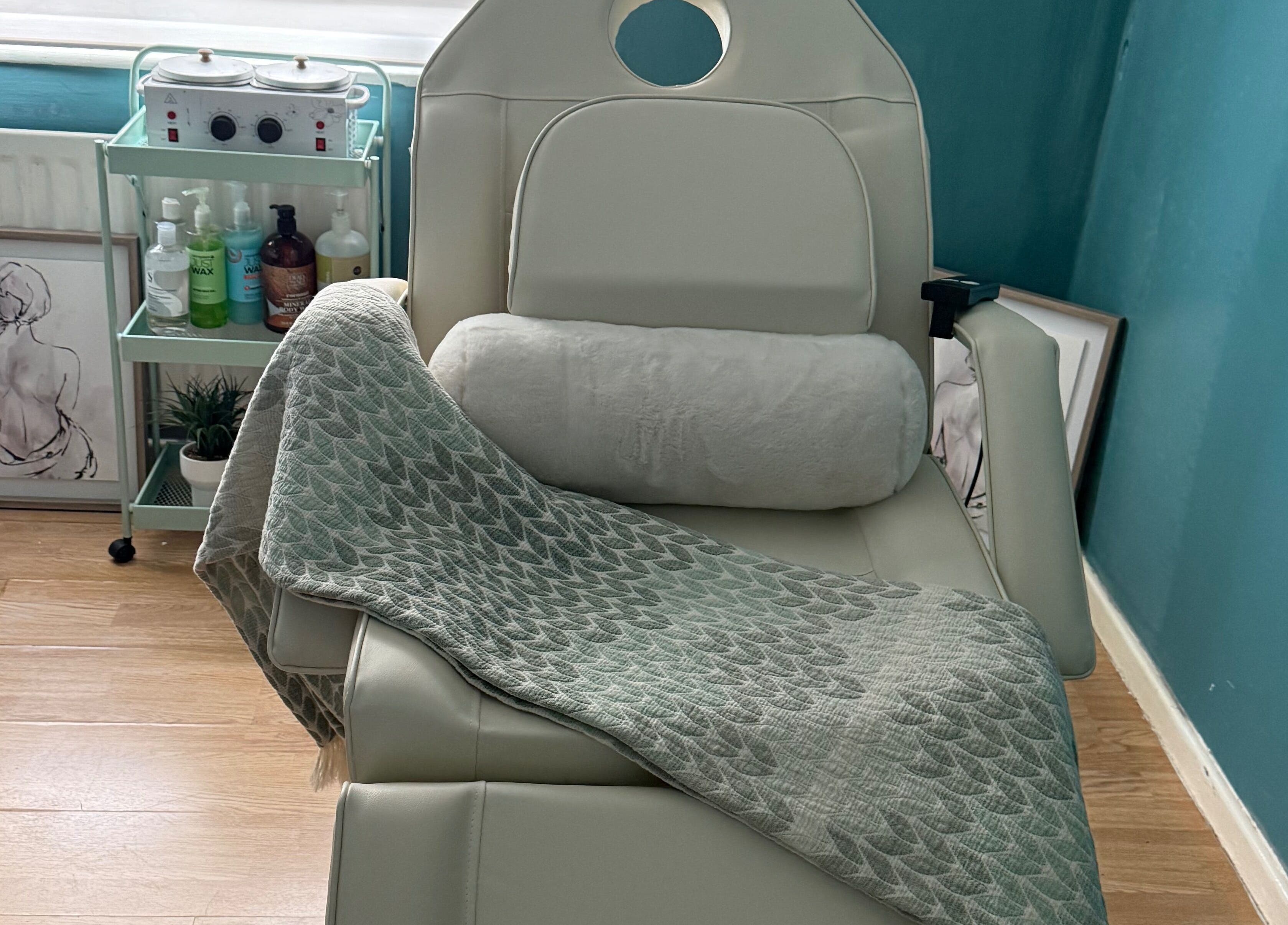 Relaxing treatment chair at FMac Beauty in Middlesbrough, England, GB, with cozy blanket and spa essentials.