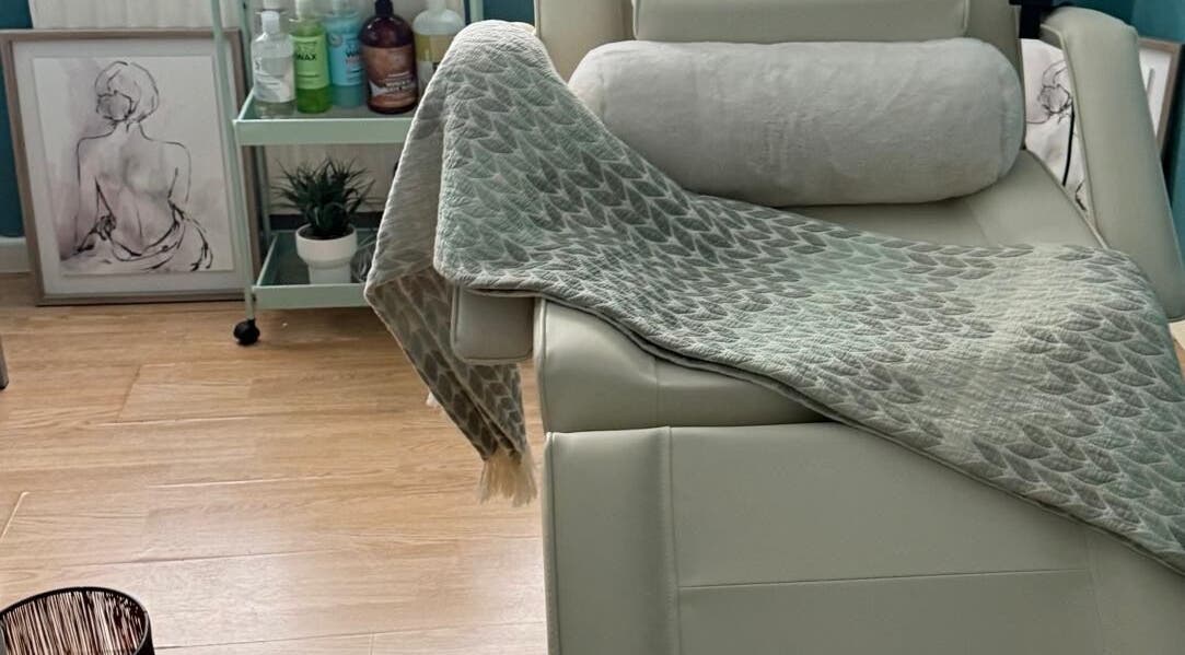 Cozy treatment chair at FMac Beauty, Middlesbrough, England, GB, with soothing decor for relaxation.