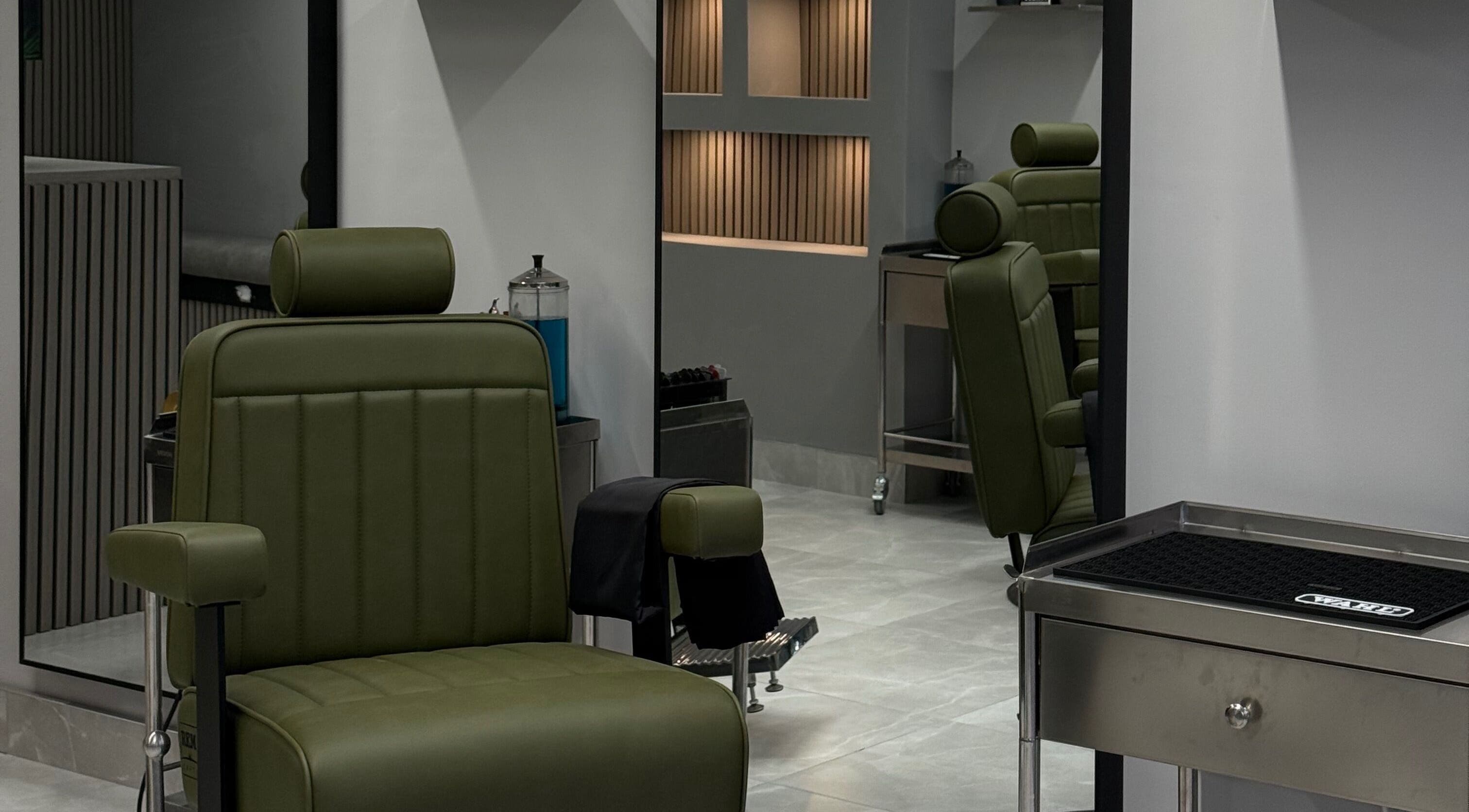 Barber chair at Mist Male Grooming, Dunmurry, Northern Ireland, GB, featuring a sleek and modern design.