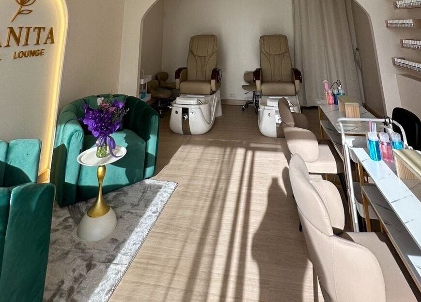Elegant interior of Kanita Nail Lounge in Tambon Hua Hin, Chang Wat Prachuap Khiri Khan, TH, featuring comfy seating.
