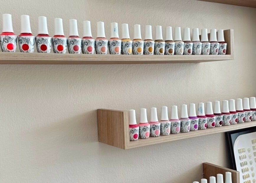 Vibrant nail polish selection at Kanita Nail Lounge, Tambon Hua Hin, Chang Wat Prachuap Khiri Khan, TH.