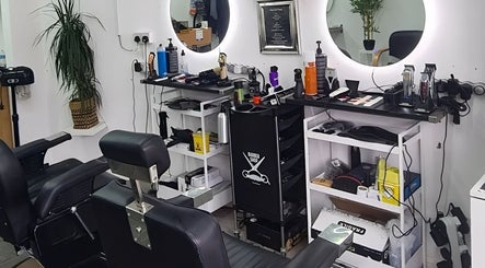 Grooming chairs and tools at Urban Kutz, Stretford, England, GB, showcasing modern barber setup.