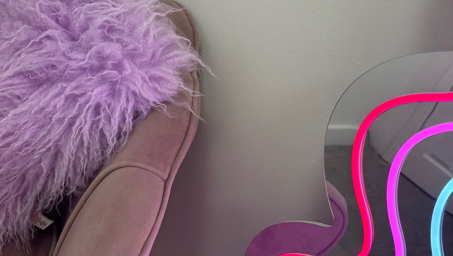 Lavender plush chair and neon lights at ByKG Lashes & Brows, Swords, County Dublin, IE.