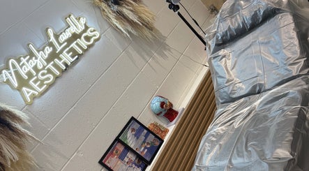 Modern treatment room at The Beauty Specialist, Hyde, England, GB with aesthetic decor and sleek setup.