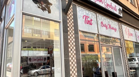 Exterior view of Glam Syndicate in Johannesburg, Gauteng, ZA showcasing beauty services signage.