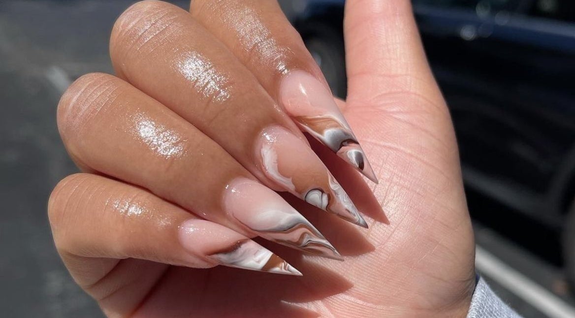 Stylish marble nail art at K Nail Studio in Nassau, New Providence, BS.