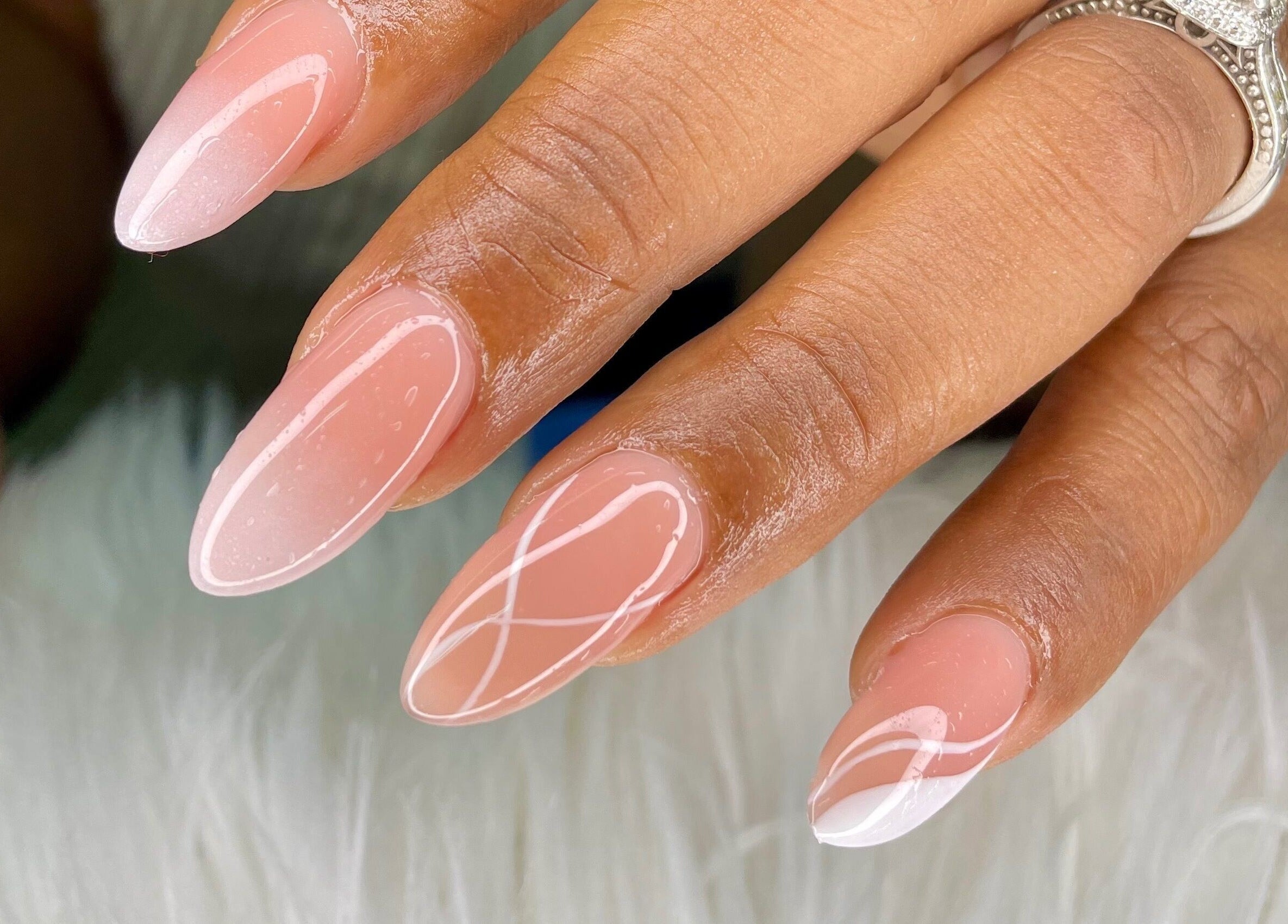 Elegant manicured nails with creative designs at Wino'S Nail Pub, Gaborone, Gaborone City, BW.