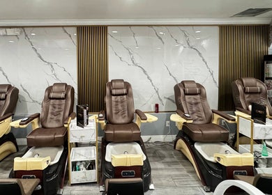 Luxurious spa chairs at Noire The Nail Bar - Bell Tower Shop, Fort Myers, FL, US.