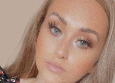 Woman with flawless makeup, showcasing Ninetyseven's beauty services in Dungannon, Northern Ireland, GB.