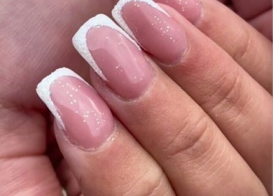 Elegant pink and white glitter French manicure at Ninetyseven, Dungannon, Northern Ireland, GB.