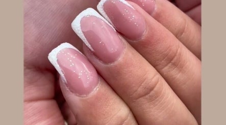Elegant pink and white glitter French manicure at Ninetyseven, Dungannon, Northern Ireland, GB.