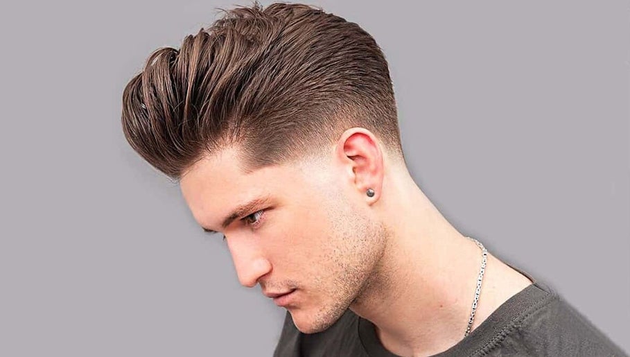 Modern pompadour hairstyle at Massage Day in Makati City, Metro Manila, PH, showcasing sleek precision styling.