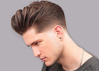 Modern pompadour hairstyle at Massage Day in Makati City, Metro Manila, PH, showcasing sleek precision styling.