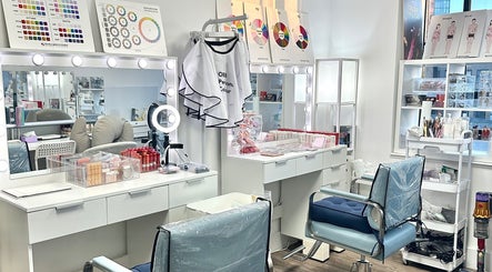 Interior of OBB Personal Colour in London, England, GB, featuring makeup stations and colour charts.