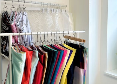 Colorful fabric samples at OBB Personal Colour, London, England, GB, showcasing vibrant style options.