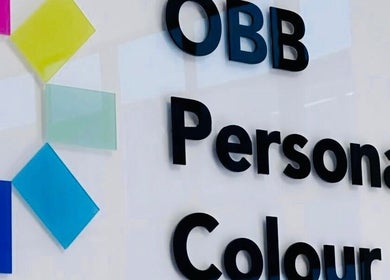 Colorful wall art at OBB Personal Colour, London, England, GB, featuring bold geometric shapes.