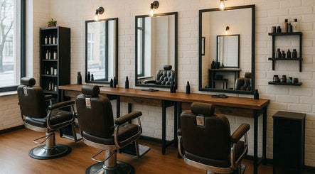 Elegant barber chairs and mirrors at KCuts in Sheboygan, US, offering a modern hair styling experience.