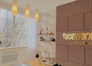 Elegant treatment room at Skin Sculptura, Liverpool, England, GB showcasing chic decor and natural light.