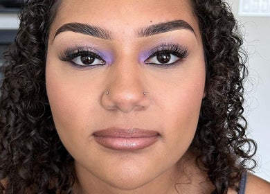 Elegant makeup with purple eyeshadow at Yours Truly, Jace in Los Angeles, California, US.
