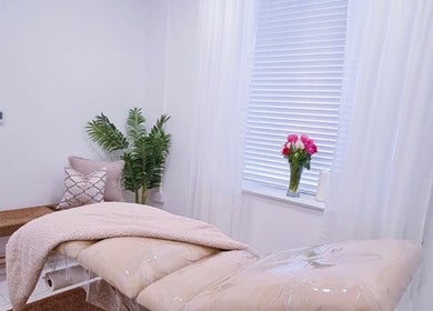 Relaxing therapy room at Bella Beauty By Sarah, Merthyr Tydfil, Wales, GB, featuring a cozy bed and serene decor.